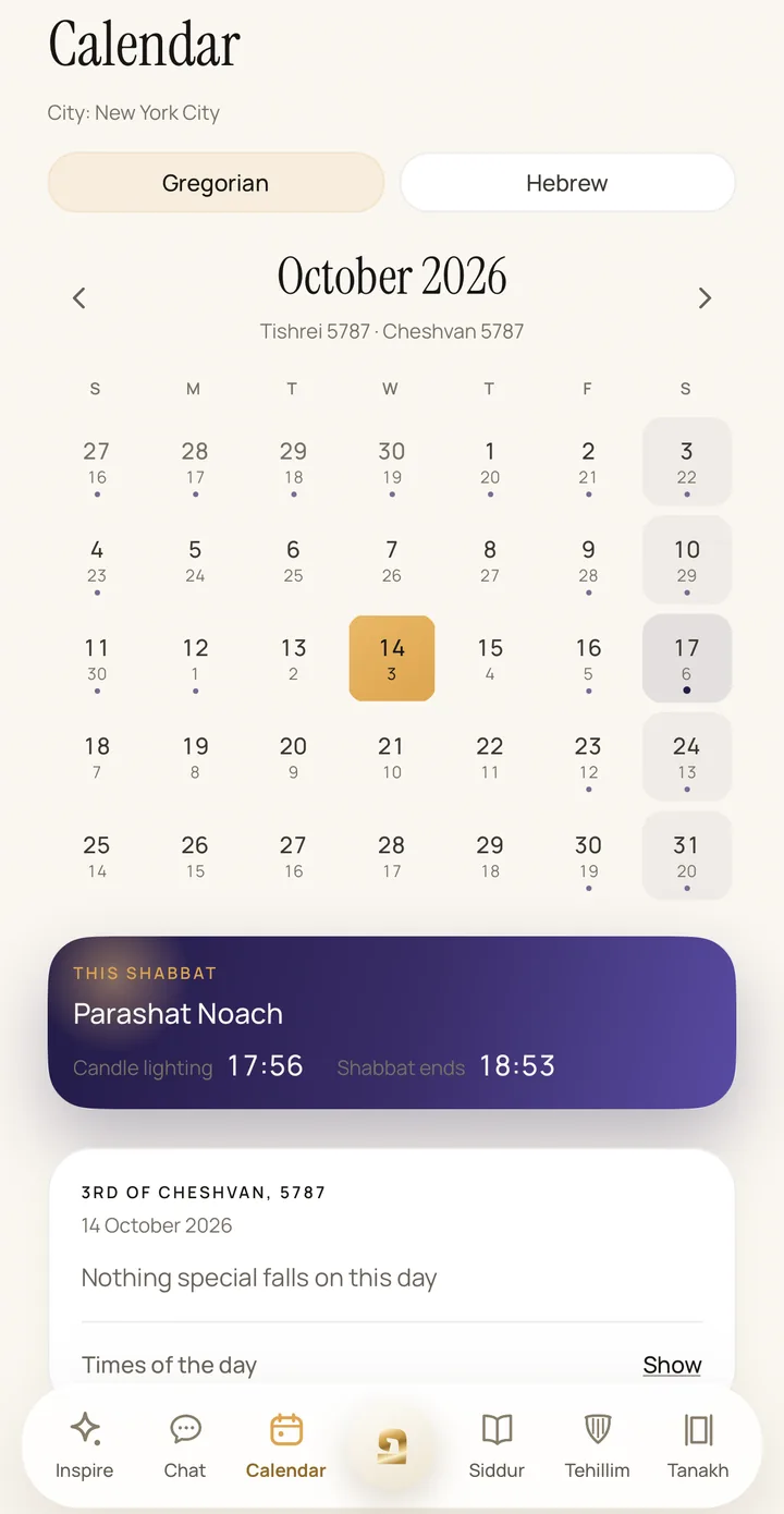 Psia's calendar: the city New York City at the top, a switch between civil and Hebrew months, October 2026 with the Hebrew dates beside the civil ones, and the This Shabbat card with candle lighting at 17:56 and Shabbat ending at 18:53